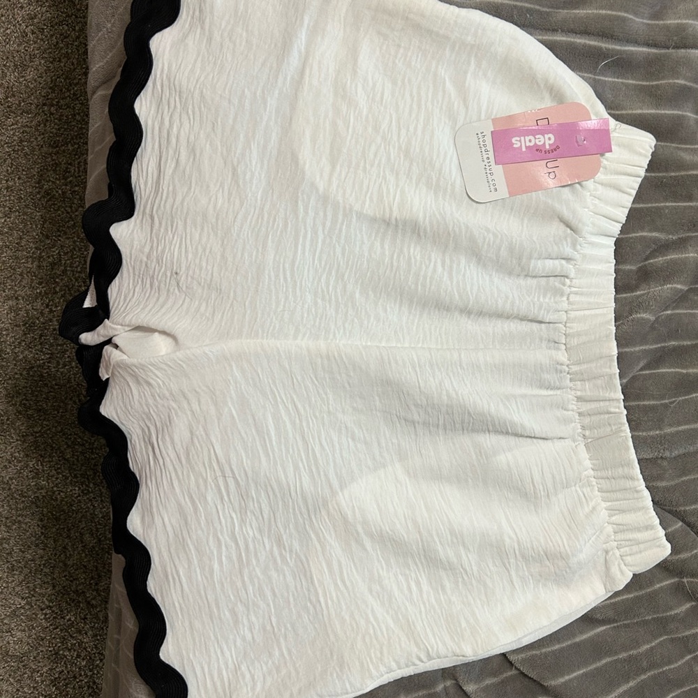 White Shorts with Black Trim